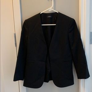 Like new open front 3/4 sleeve wool blazer.